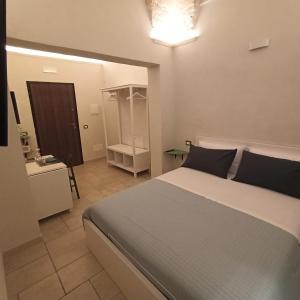 Postel nebo postele na pokoji v ubytování 18 MQ