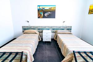 Posteľ alebo postele v izbe v ubytovaní La Senyera Apartment