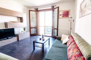 Televízia a/alebo spoločenská miestnosť v ubytovaní La Senyera Apartment