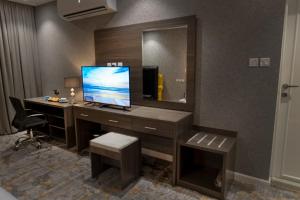 TV a/nebo společenská místnost v ubytování WS Hotel