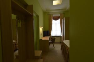 TV/Unterhaltungsangebot in der Unterkunft Apartments and Rooms kod Eli