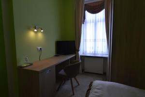 TV/Unterhaltungsangebot in der Unterkunft Apartments and Rooms kod Eli