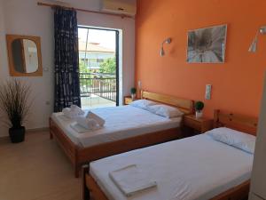 A bed or beds in a room at Blue Horizon