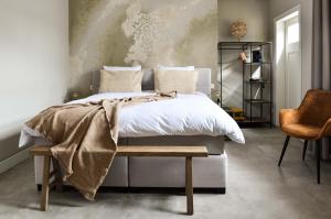 Llit o llits en una habitació de Herberg de Zwaan Elspeet