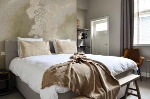 Postel nebo postele na pokoji v ubytování Herberg de Zwaan Elspeet