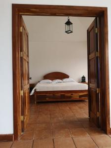 Kama o mga kama sa kuwarto sa Vista Encantada Hotel & Masajes Profesionales