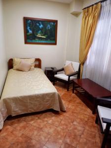 Voodi või voodid majutusasutuse HOTEL ACHALAY toas