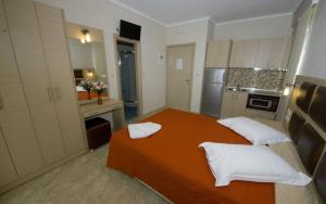 Kuchyň nebo kuchyňský kout v ubytování Gaia Studios & Apartments