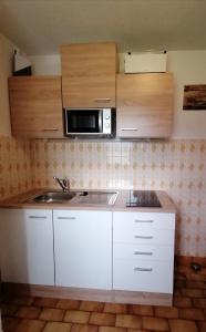 Kuchyň nebo kuchyňský kout v ubytování Ferienwohnung Prast