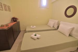 A bed or beds in a room at Blue Bay View - Beach House