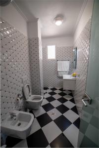 Kylpyhuone majoituspaikassa Sofi Apartments