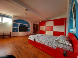 Postel nebo postele na pokoji v ubytování Apartament "3 PAPUCI"