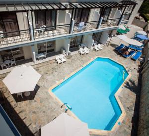 an overhead view of a swimming pool in a hotel at Crystallo Apartments in Paphos