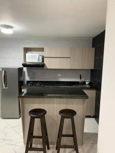 Кухня или мини-кухня в Apartamento cerca a Plaza Mayor en Medellín
