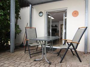 En terrasse eller udendørsområde på Ferienwohnung Strandidyll, Trassenheide