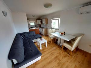 Kuchyň nebo kuchyňský kout v ubytování Apartman Željo + 8 fotografií