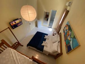 an overhead view of a room with a bed at Refúgio Pousada Fortaleza in Fortaleza