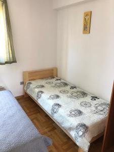 Postel nebo postele na pokoji v ubytování Vito & Rocco Apartment