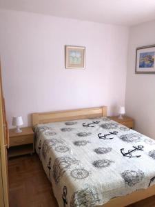 Postel nebo postele na pokoji v ubytování Vito & Rocco Apartment + 31 fotografií