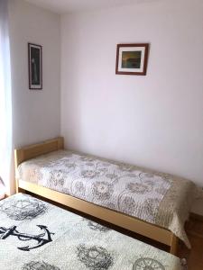 Postel nebo postele na pokoji v ubytování Vito & Rocco Apartment