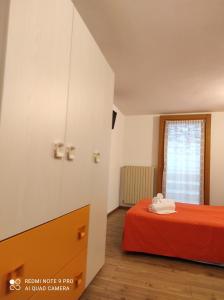 Postel nebo postele na pokoji v ubytování Orobie Holiday Apartments