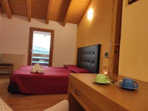 Postel nebo postele na pokoji v ubytování Orobie Holiday Apartments