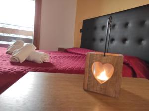 Postel nebo postele na pokoji v ubytování Orobie Holiday Apartments