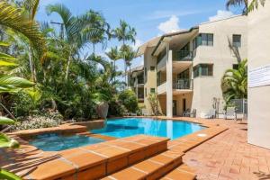 an image of a swimming pool in front of a building at HOWARD 11-7 Noosa River at your doorstep in Noosaville