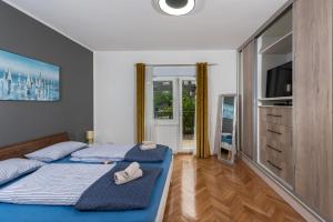 Posteľ alebo postele v izbe v ubytovaní Suit B&R