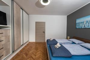 Posteľ alebo postele v izbe v ubytovaní Suit B&R