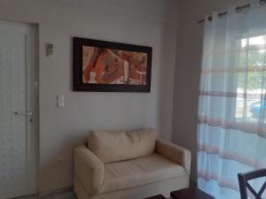 Posezení v ubytování KAMARI APARTMENTS