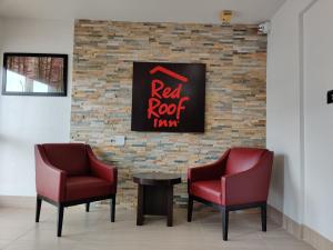 Posezení v ubytování Red Roof Inn Houston - Jersey Village
