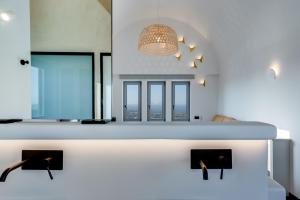 Rúm í herbergi á Elements Cozy Suites Pyrgos