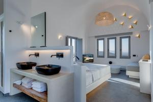 Rúm í herbergi á Elements Cozy Suites Pyrgos
