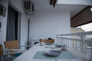 Posezení v ubytování Grey Theros Apartments