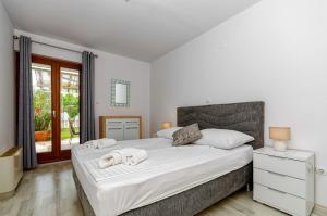 Posteľ alebo postele v izbe v ubytovaní Apartments Mrs Brightside