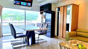 Televisor o centre d'entreteniment de PATONG TOWER ROYAL FAMILY pta 2025
