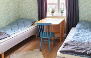 Postel nebo postele na pokoji v ubytování Awesome Home In Bullebo With Wifi And 3 Bedrooms
