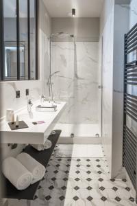 Ванная комната в Hotel de la Plage