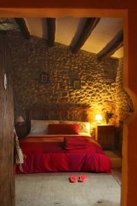 A bed or beds in a room at Mas La Casa Nova