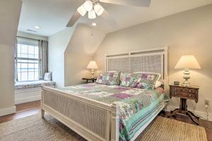 a bedroom with a bed and a ceiling fan at Cambridge Beach Home on Choptank River with Pier! in Cambridge