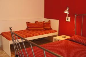 A bed or beds in a room at Apartment Helios