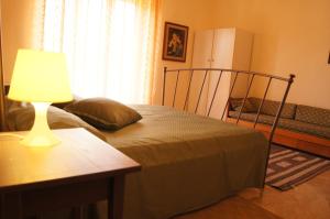 A bed or beds in a room at Apartment Helios