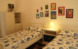 A bed or beds in a room at Apartment Helios