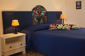 A bed or beds in a room at Apartment Helios