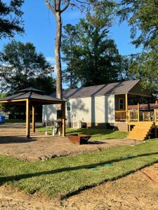 a park with a pavilion and a tree at Cozy Cabin in Crestwood Subdivision in Avinger