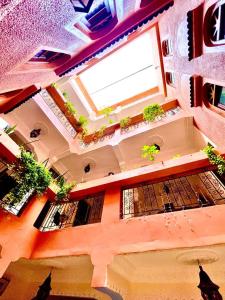 an overhead view of a building with a large window at Riad dar Ahlam in Aït Baha