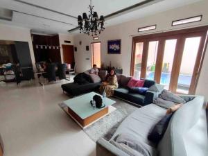 Area tempat duduk di Nice house with modern furniture at Bandung