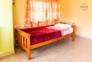 Postel nebo postele na pokoji v ubytování Cabaña Piedemonte