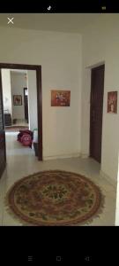a living room with a large rug on the floor at chalet for rent at marina 7 el alamein 4 bedrooms air conditions marina card in El Alamein
